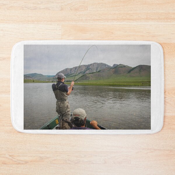 Item preview, A fisherman with a Taimen Trout on the end of his line in Mongolia designed and sold by SnapTPhotograph.