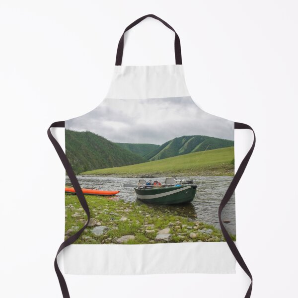Item preview, A fishing raft and kayak anchored on grass bank beside the river designed and sold by SnapTPhotograph.