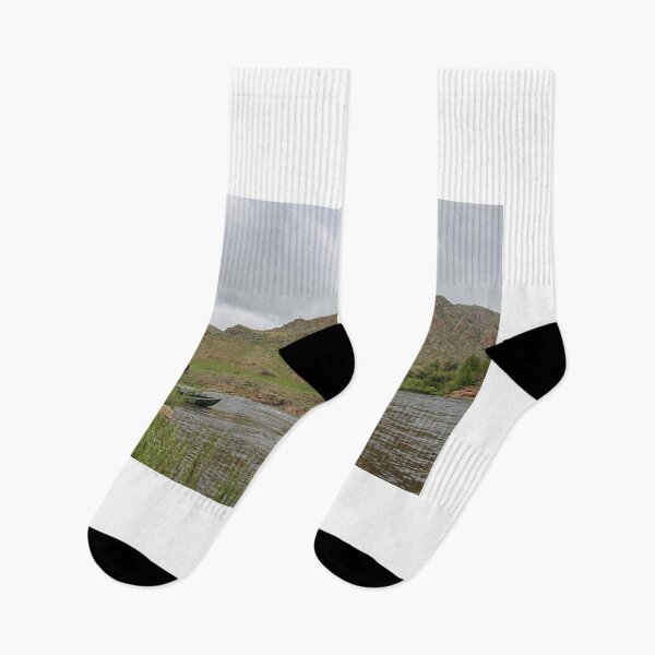 Item preview, Fly fisherman casting a fly on a river in Mongolia during the summer designed and sold by SnapTPhotograph.