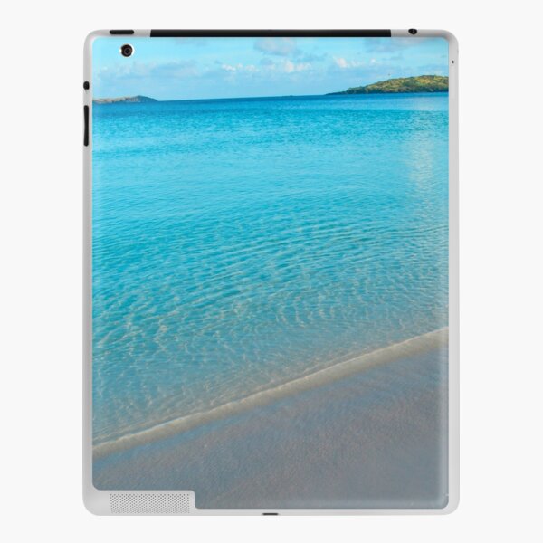 Turquoise white-sand beach in the morning iPad Skin