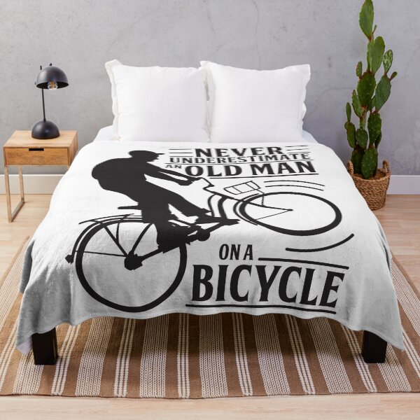 Item preview, Never Underestimate An Old Man On a Bicycle designed and sold by Andantino.