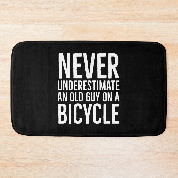 Item preview, Never Underestimate An Old Guy On A Bicycle designed and sold by evokearo.