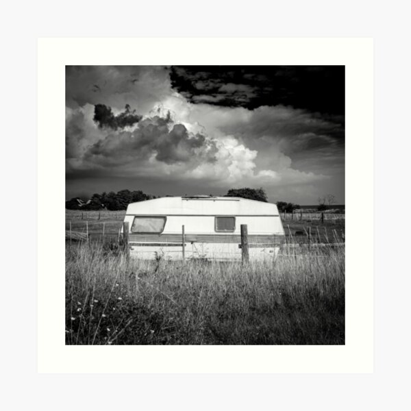 an abandoned caravan in an idyllic pasture Art Print