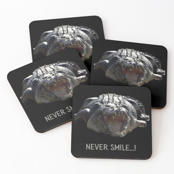 Item preview, Never smile (at a crocodile). Photograph of a crocodile and grey text. designed and sold by JellyBeenzz.