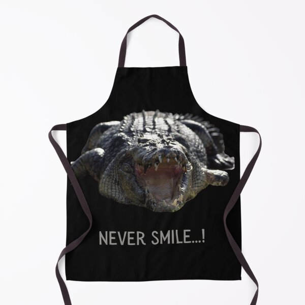 Item preview, Never smile (at a crocodile). Photograph of a crocodile and grey text. designed and sold by JellyBeenzz.