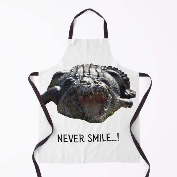 Item preview, Never smile (at a crocodile). Photograph of a crocodile and black text. designed and sold by JellyBeenzz.