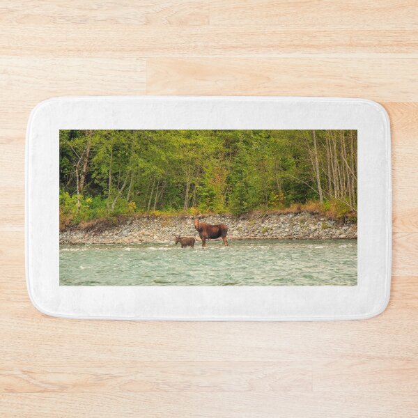 Item preview, Mother Moose and her calf trying to cross a fast flowing glacial blue river in British Columbia, Canada. designed and sold by SnapTPhotograph.