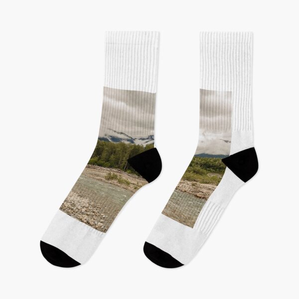 Item preview, Braided river channel with woodland and mountains in the distance, on an overcast day, Skeena River, British Columbia, Canada. designed and sold by SnapTPhotograph.