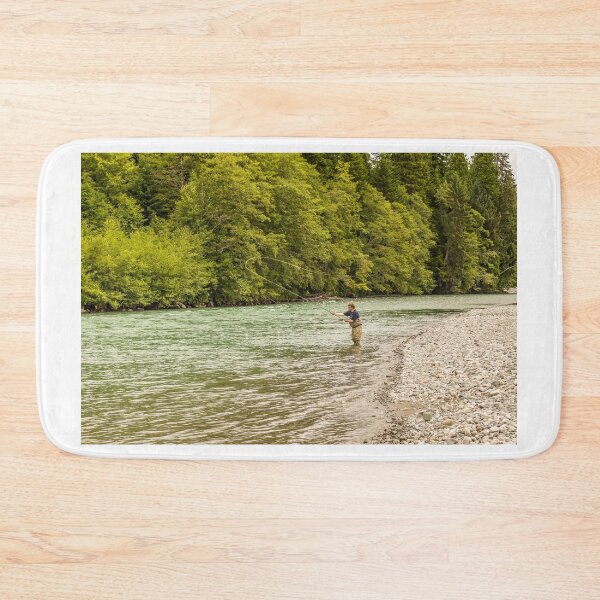 Item preview, A fly fisherman spey casting, while wading in the fast flowing Kitimat River designed and sold by SnapTPhotograph.