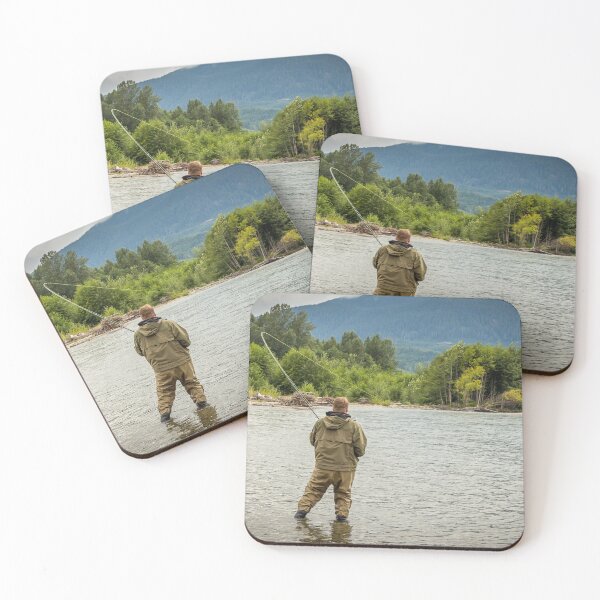 Item preview, Fisherman battling a fish with a bent rod, while wading. designed and sold by SnapTPhotograph.