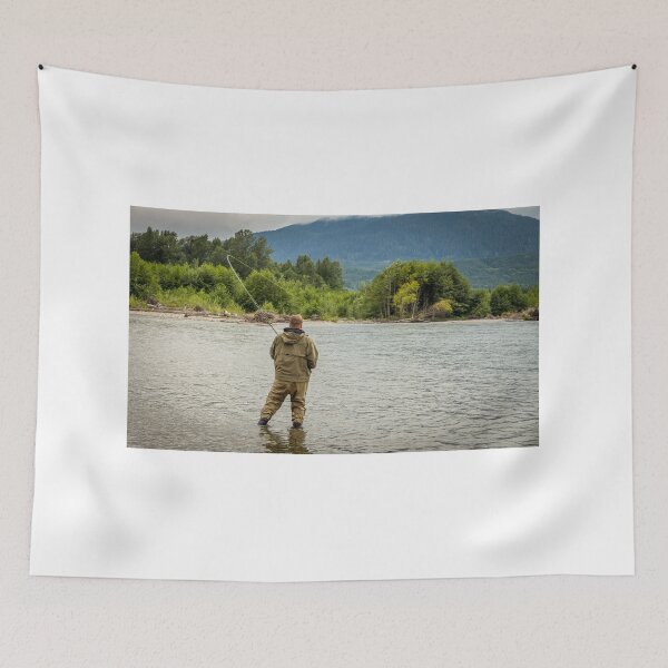Item preview, Fisherman battling a fish with a bent rod, while wading. designed and sold by SnapTPhotograph.