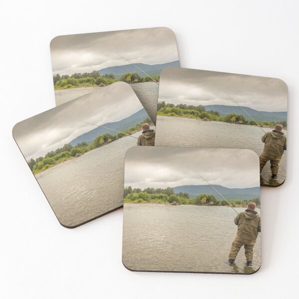Item preview, Fisherman battling a fish with a bent rod, while wading. designed and sold by SnapTPhotograph.