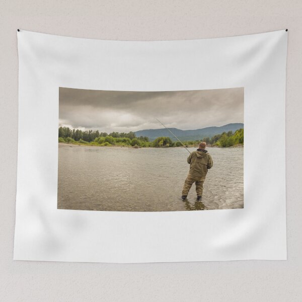 Item preview, Fisherman battling a fish with a bent rod, while wading. designed and sold by SnapTPhotograph.