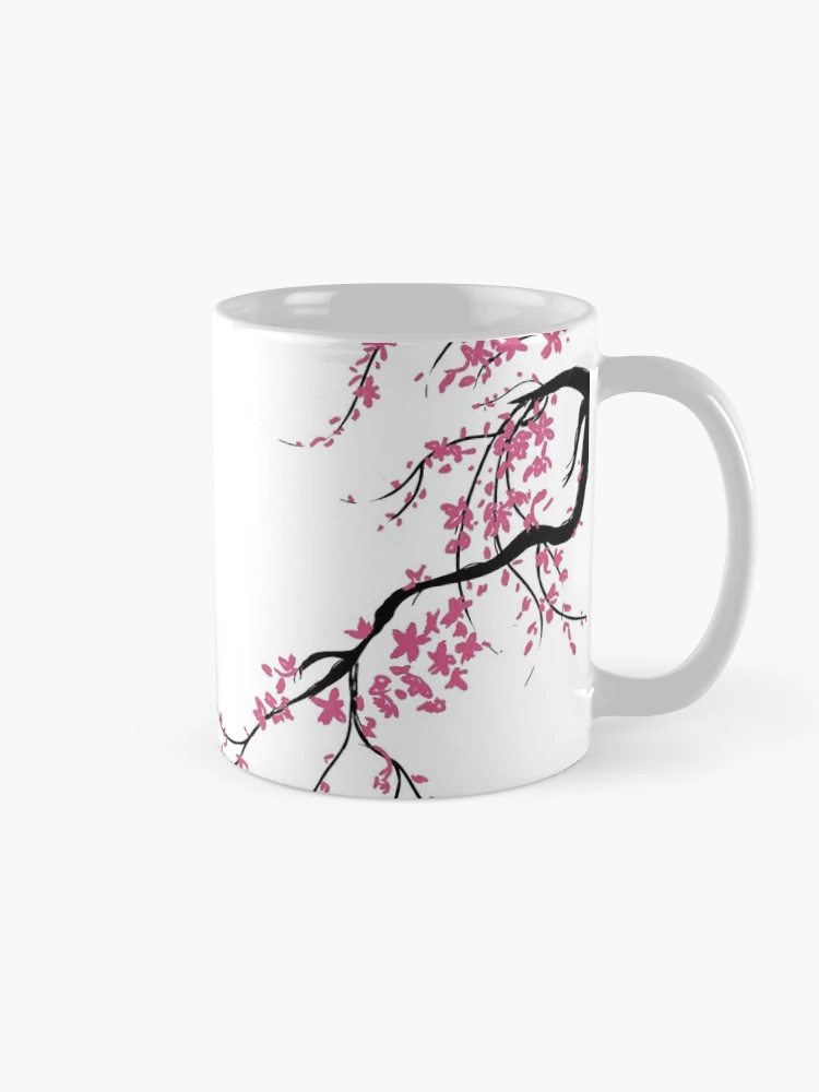 Un magnifique mug à thé à motif fleur de cerisier avec couvercle et filtre  en inox !