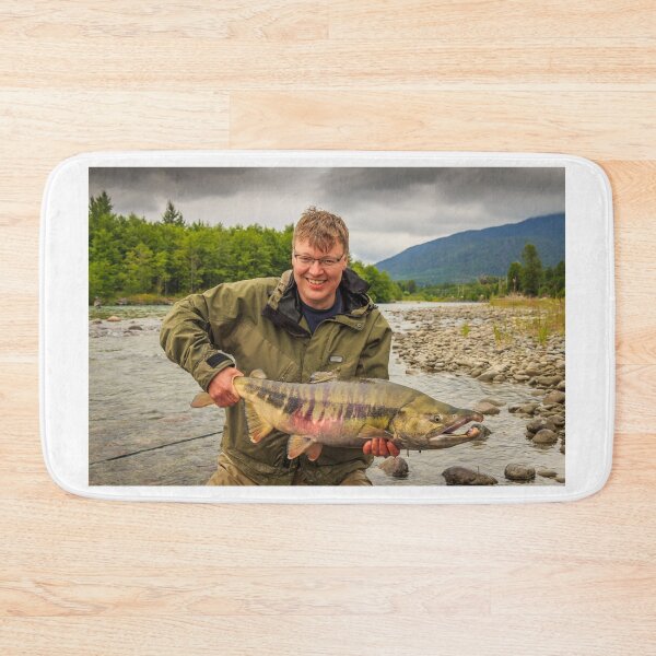Item preview, A happy sport fisherman holding up a big trophy Chum Salmon designed and sold by SnapTPhotograph.