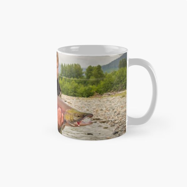 Item preview, A happy fisherman proudly holding up a sockeye salmon designed and sold by SnapTPhotograph.