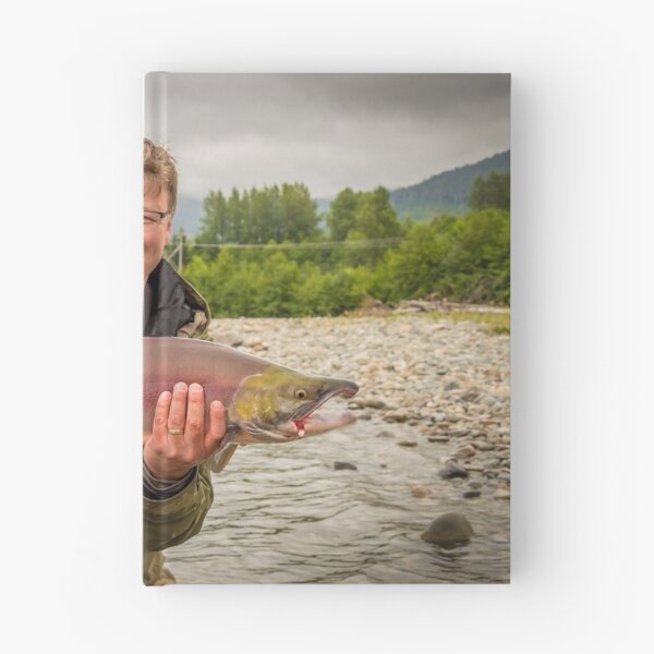 Item preview, A happy fisherman proudly holding up a sockeye salmon designed and sold by SnapTPhotograph.