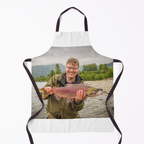 Item preview, A happy fisherman proudly holding up a sockeye salmon designed and sold by SnapTPhotograph.