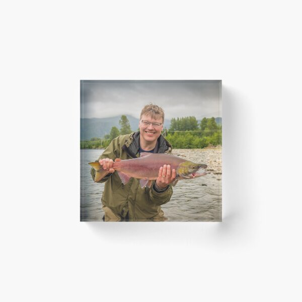 Item preview, A happy fisherman proudly holding up a sockeye salmon designed and sold by SnapTPhotograph.