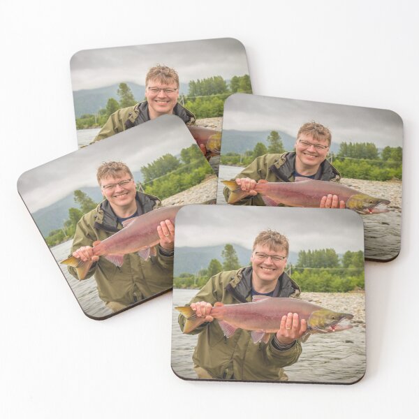 Item preview, A happy fisherman proudly holding up a sockeye salmon designed and sold by SnapTPhotograph.