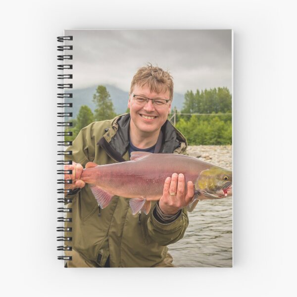 Item preview, A happy fisherman proudly holding up a sockeye salmon designed and sold by SnapTPhotograph.