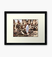 A French boy introduces himself to Indian soldiers who had just arrived in France to fight alongside French and British forces, Marseilles, 30th September 1914 Framed Print