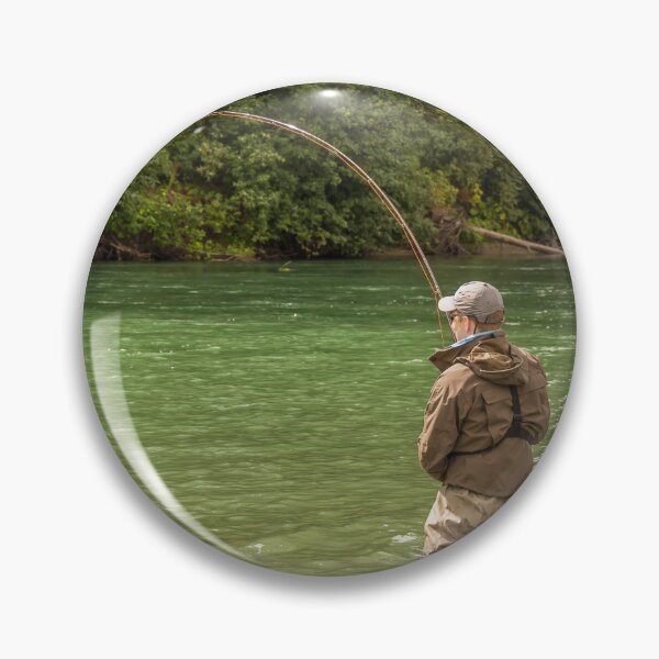 Item preview, A man hooked into a fish while fly fishing on a deep green river designed and sold by SnapTPhotograph.