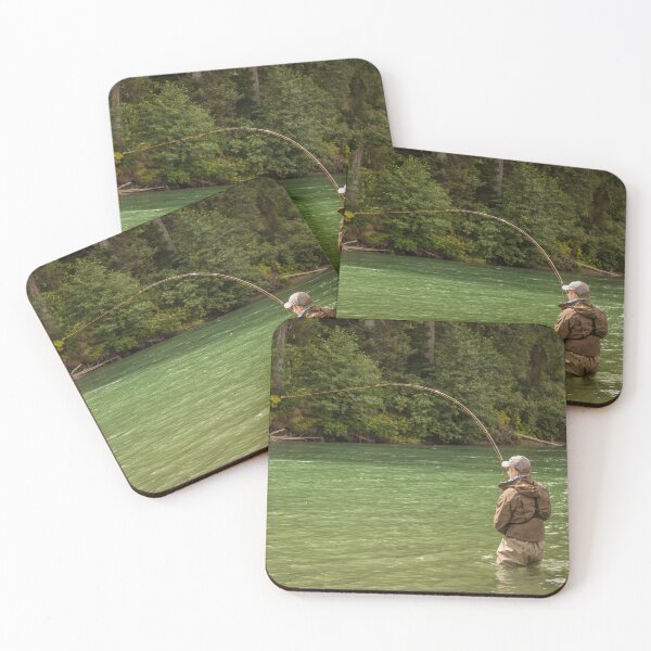 Item preview, A man hooked into a fish while fly fishing on a deep green river designed and sold by SnapTPhotograph.
