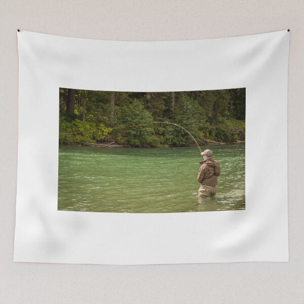 Item preview, A man hooked into a fish while fly fishing on a deep green river designed and sold by SnapTPhotograph.