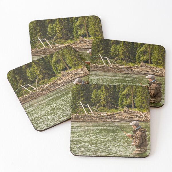 Item preview, A man hooked into a fish while fly fishing on a deep green river. designed and sold by SnapTPhotograph.