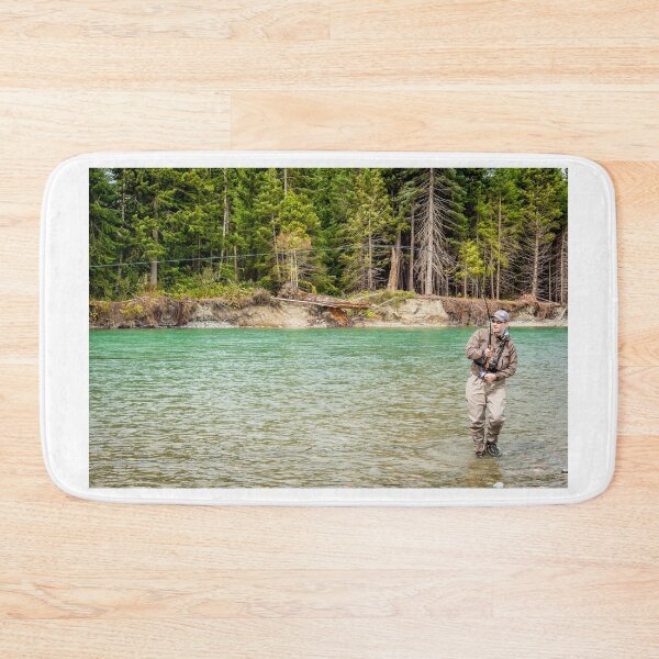 Item preview, A sport fly fisherman hooked into a salmon on a river in British Columbia designed and sold by SnapTPhotograph.