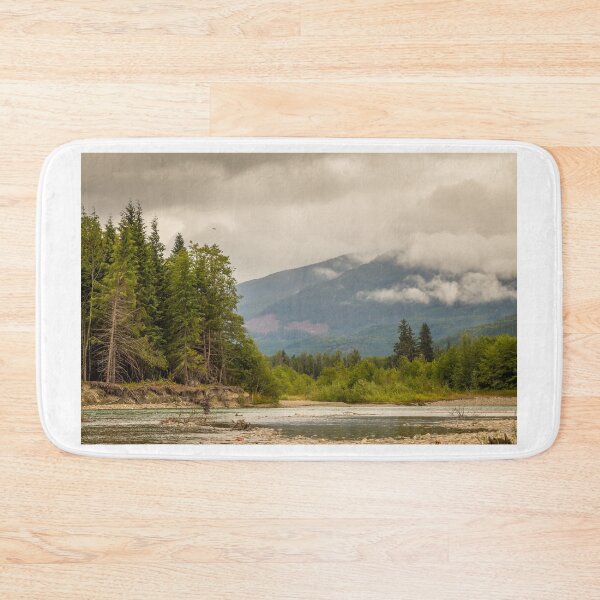 Item preview, Landscape of a river, mountain and forest, with an eagle in the sky, during a cloudy summer day. designed and sold by SnapTPhotograph.