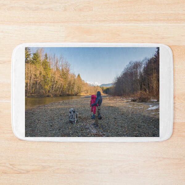 Item preview, A mother and daughter looking at mountains in the spring morning sun designed and sold by SnapTPhotograph.