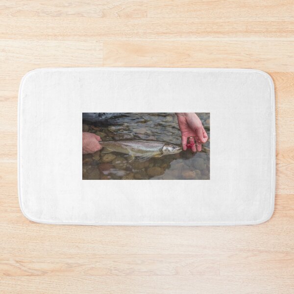 Item preview, A close up of a Bull trout in the water, caught on a red intruder fly designed and sold by SnapTPhotograph.