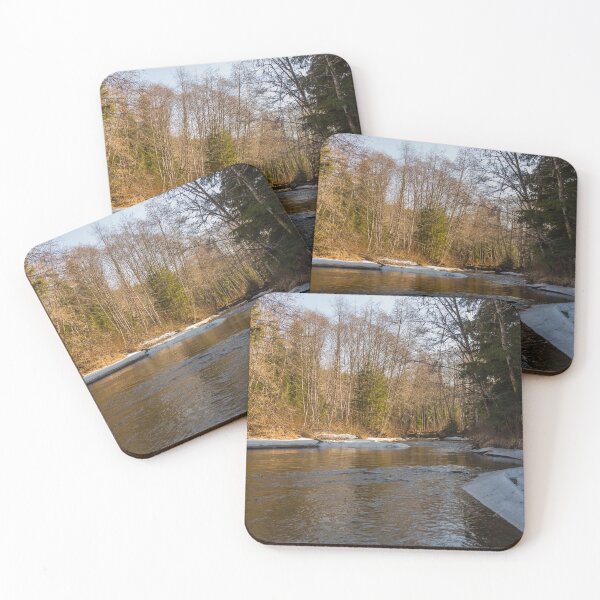 Item preview, A snow covered stream in the spring morning sun designed and sold by SnapTPhotograph.
