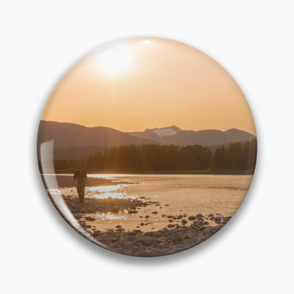 Item preview, A fisherman walking along a gravel bar beside the Skeena River at sunset designed and sold by SnapTPhotograph.