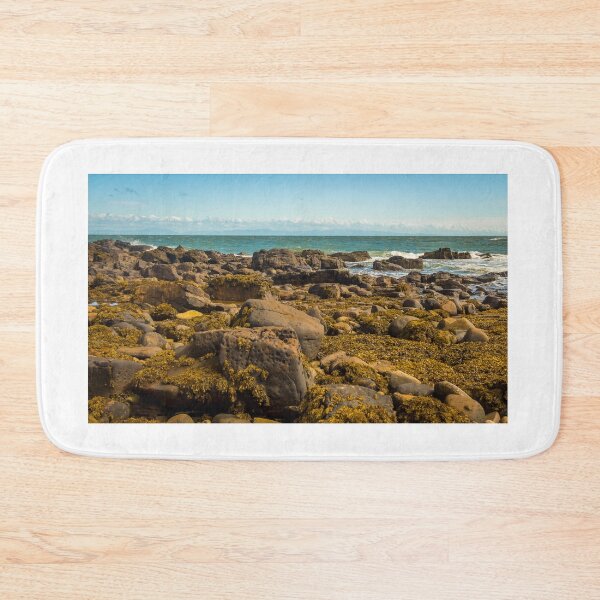 Item preview, A rocky shoreline at low tide, with seaweed on the rocks in southern Scotland designed and sold by SnapTPhotograph.