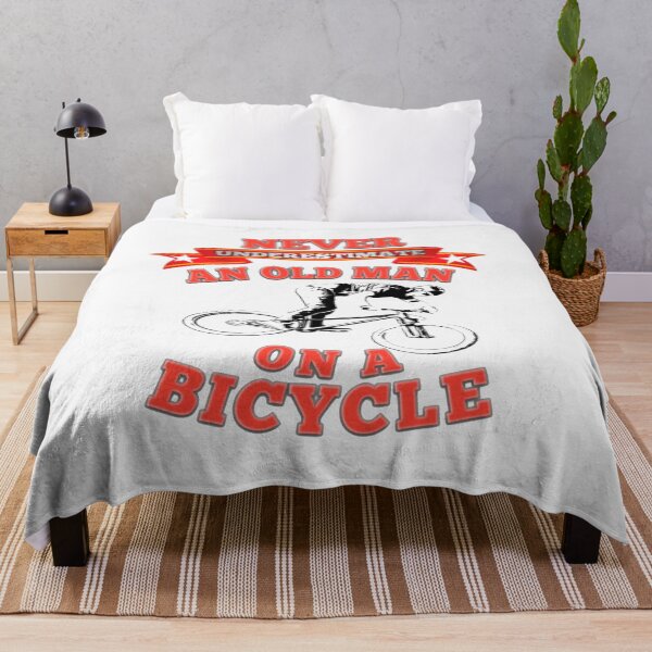 Item preview, Never underestimate an old man on a bicycle designed and sold by StyleHubDesign.