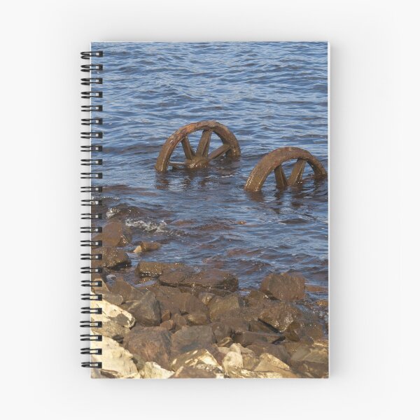 Item preview, Old train wheels in water Strahan Tasmania designed and sold by Tom McDonnell.