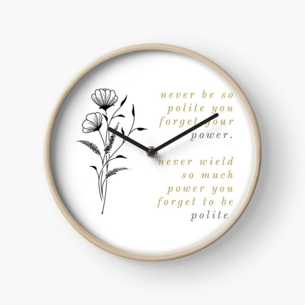 marjorie or et fleurs violettes Horloge