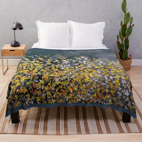 Item preview, Golden autumn leaves falling on water designed and sold by Susan Sheldon.