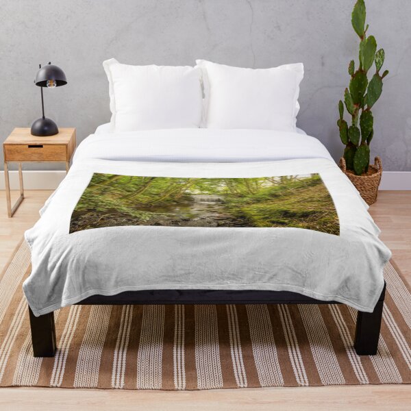 Item preview, Agua que fluye sobre una vieja presa y a través de un bosque, sobre piedras designed and sold by SnapTPhotograph.