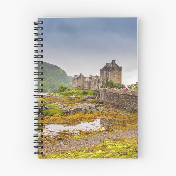 Item preview, Stormy evening clouds over Eilean Donan Castle in the Scottish Highlands designed and sold by SnapTPhotograph.