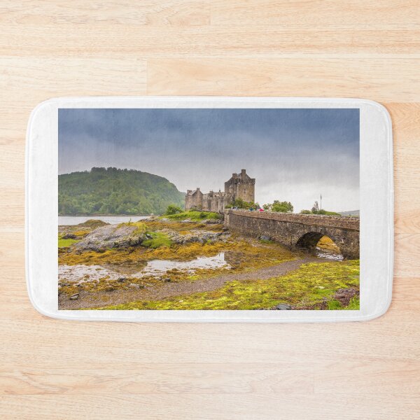 Item preview, Stormy evening clouds over Eilean Donan Castle in the Scottish Highlands designed and sold by SnapTPhotograph.