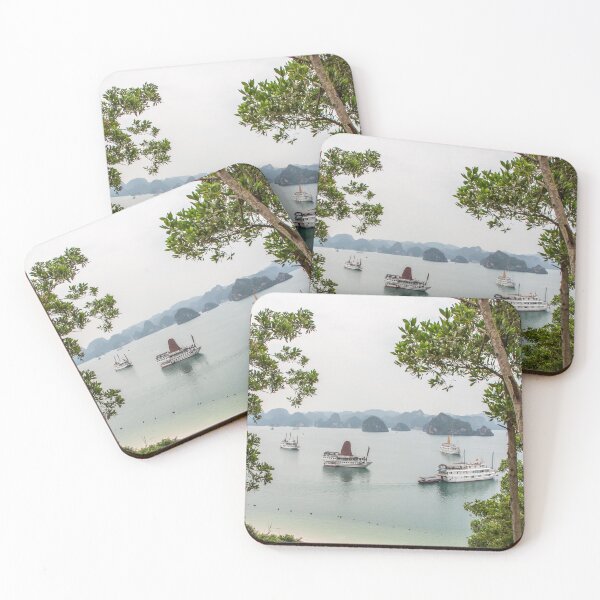 Item preview, A beautiful view of junk boats in Ha Long Bay through trees designed and sold by SnapTPhotograph.