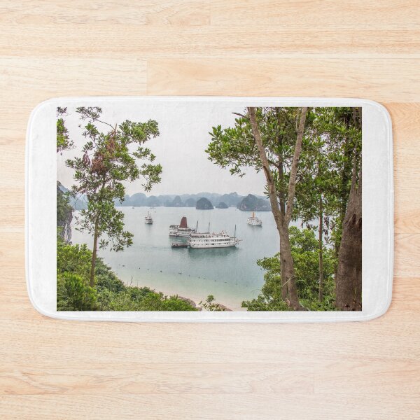Item preview, A beautiful view of junk boats in Ha Long Bay through trees designed and sold by SnapTPhotograph.
