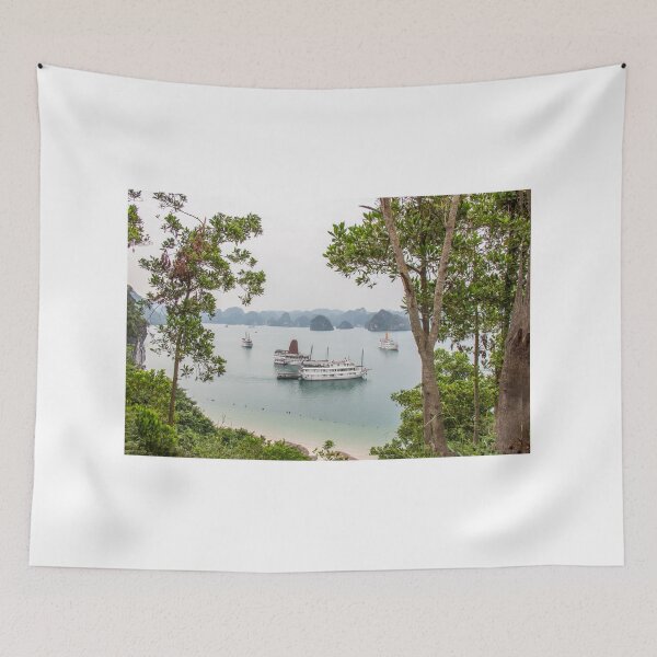 Item preview, A beautiful view of junk boats in Ha Long Bay through trees designed and sold by SnapTPhotograph.