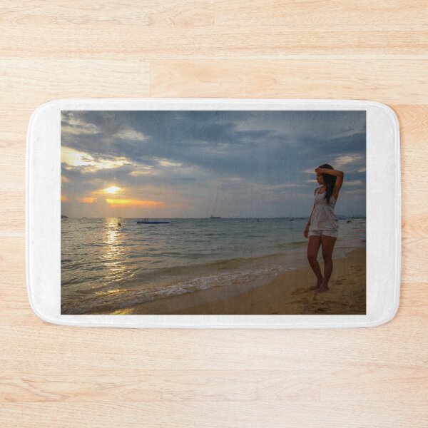 Item preview, An Asian women walking on Ba Keo beach at sunset, Phu Quoc, Vietnam designed and sold by SnapTPhotograph.