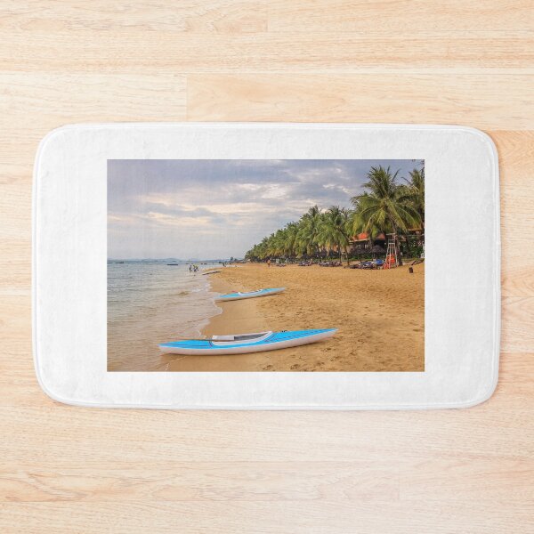 Item preview, Kayaks on Ba Keo Beach in the evening sun, next to a resort on Phu Quoc, Vietnam designed and sold by SnapTPhotograph.