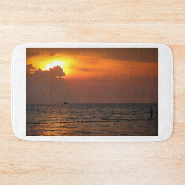 Item preview, A silhouette of a fisherman during sunset at Ba Keo Beach, Phu Quoc Island, Vietnam designed and sold by SnapTPhotograph.